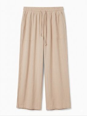 Effortless and breathable neutral wide-leg pants in a soft beige linen blend